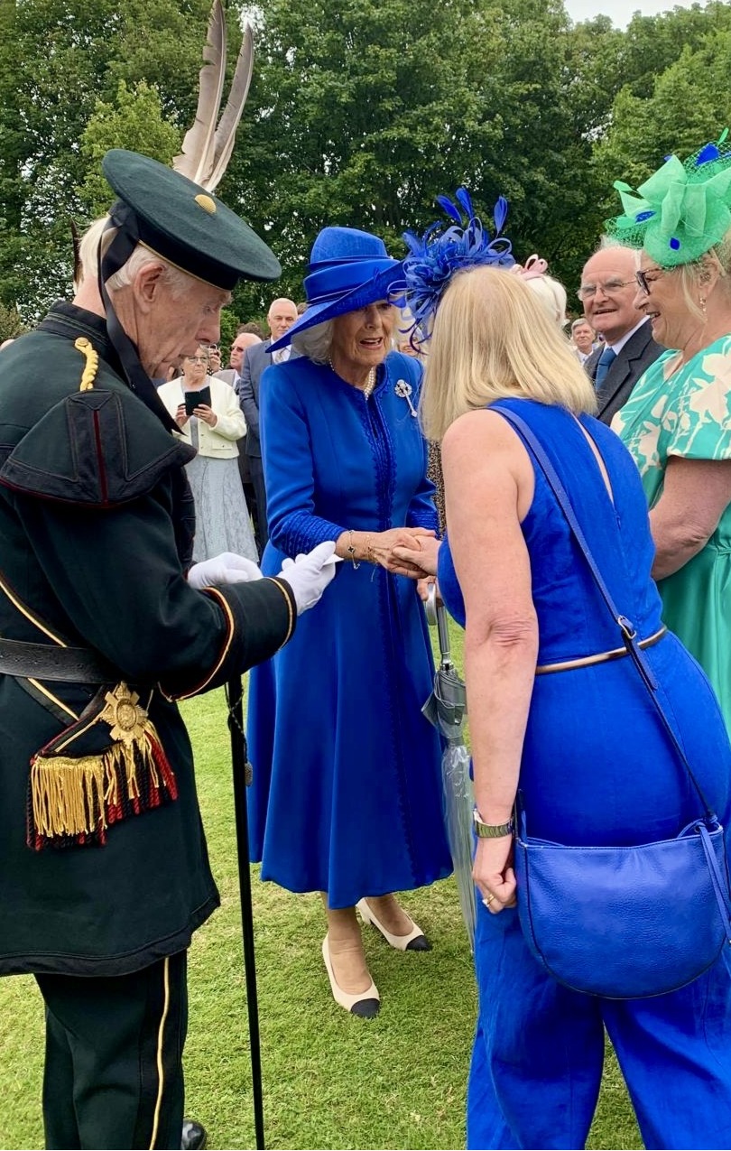 Hazel O'Brien shakes hands with Queen Camilla
