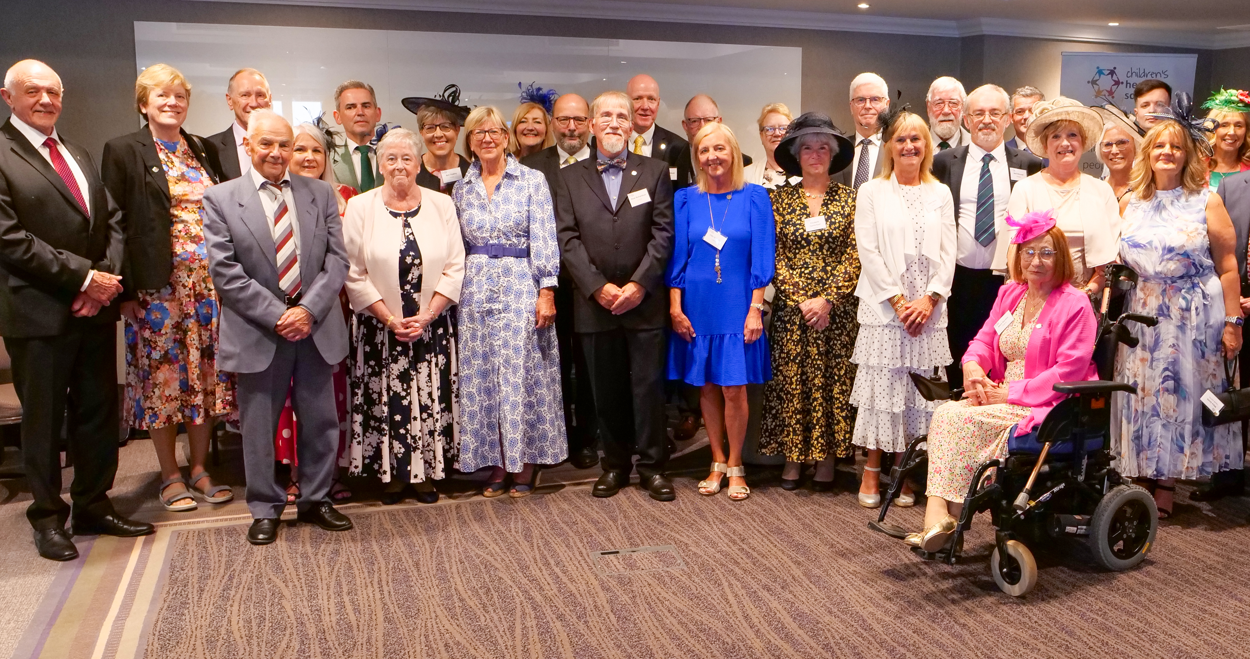Volunteers at the CHS reception before the garden party